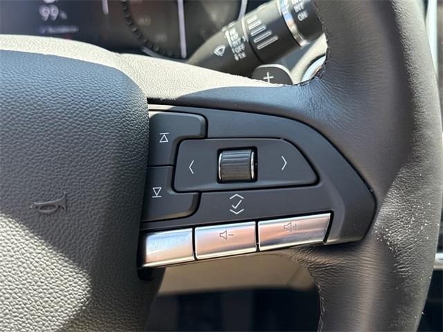 Photo of 2023 Crystal White Tri-Coat Cadillac XT4