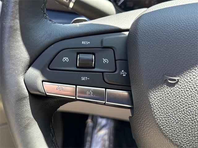 Photo of 2023 Crystal White Tri-Coat Cadillac XT4