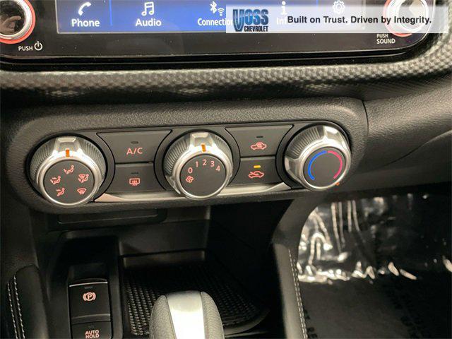 Photo of 2023 Monarch Orange Metallic/Super Black Nissan Kicks