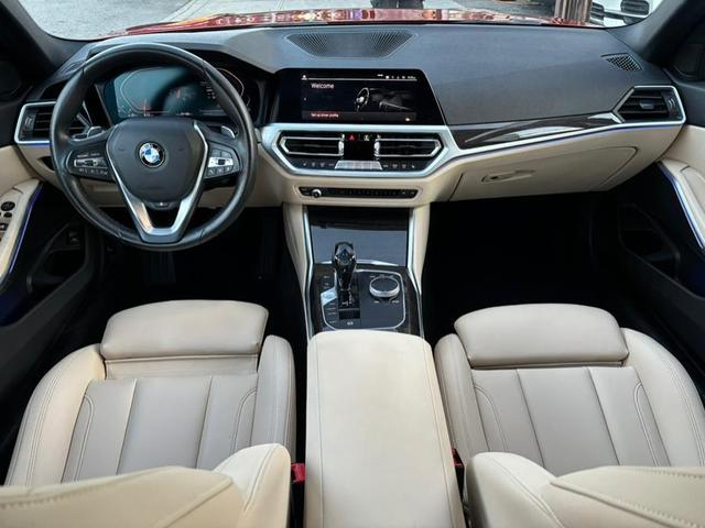 Photo of 2019 Sunset Orange Metallic BMW 330