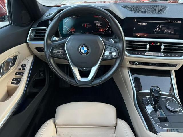 Photo of 2019 Sunset Orange Metallic BMW 330
