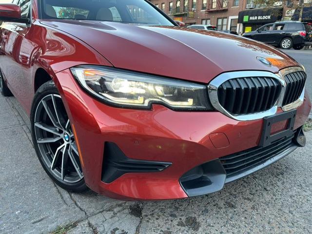 Photo of 2019 Sunset Orange Metallic BMW 330