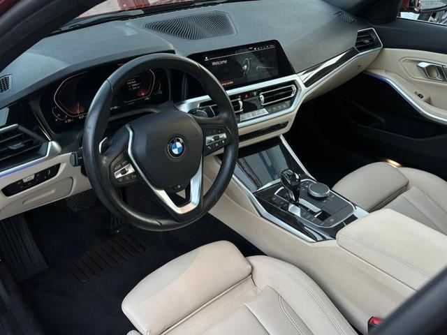 Photo of 2019 Sunset Orange Metallic BMW 330