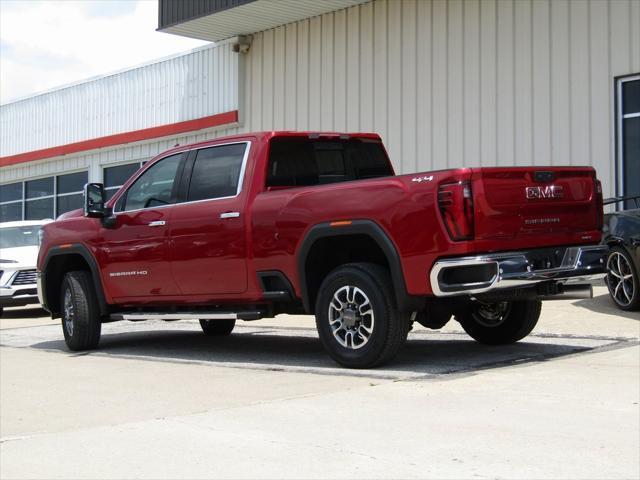 Photo of 2025 Volcanic Red Tintcoat GMC Sierra 2500
