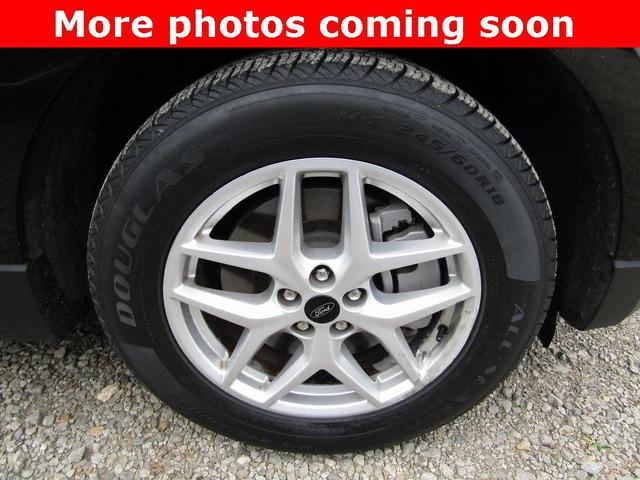Photo of 2024 Black Metallic Ford Edge