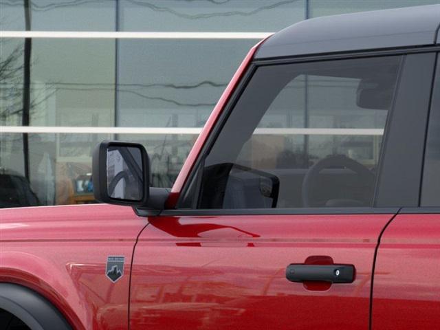 Photo of 2025 Ruby Red Metallic Tinted Clearcoat Ford Bronco