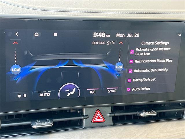Photo of 2023 Ebony Black Kia Sportage
