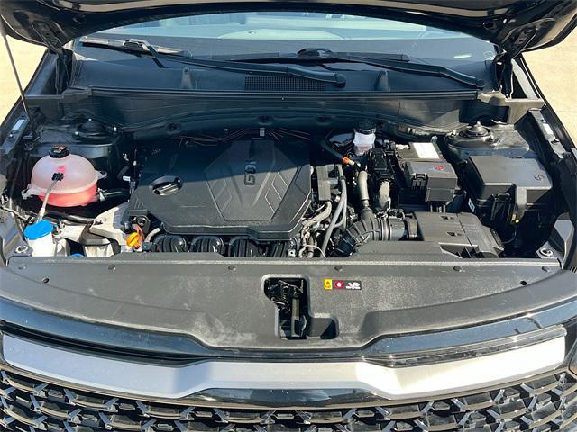 Photo of 2023 Ebony Black Kia Sportage