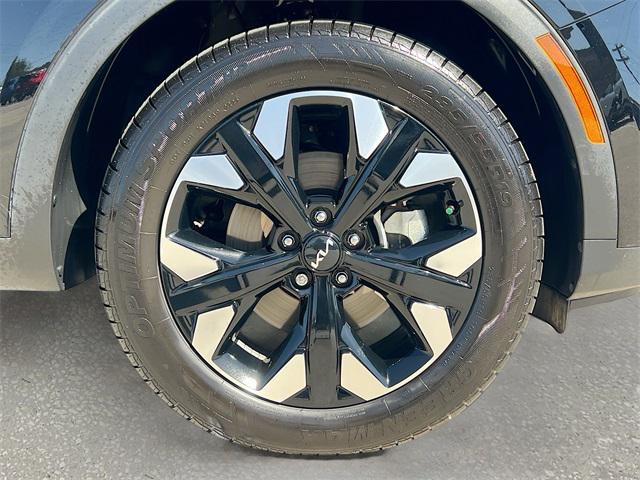 Photo of 2023 Ebony Black Kia Sportage