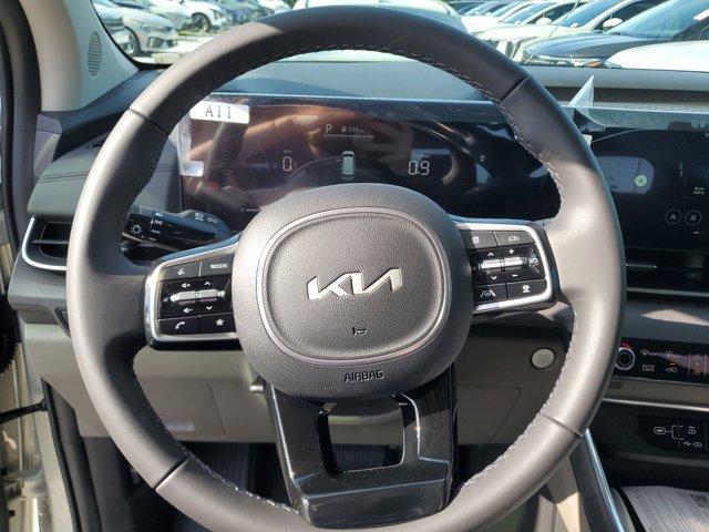 Photo of 2025 Ivory Silver Kia Carnival