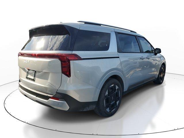 Photo of 2025 Ivory Silver Kia Carnival