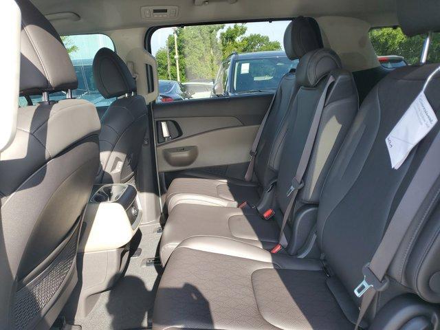 Photo of 2025 Ivory Silver Kia Carnival