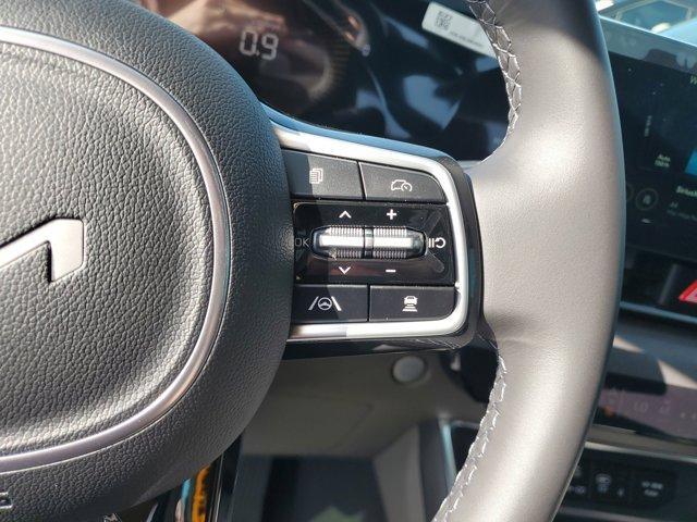 Photo of 2025 Ivory Silver Kia Carnival