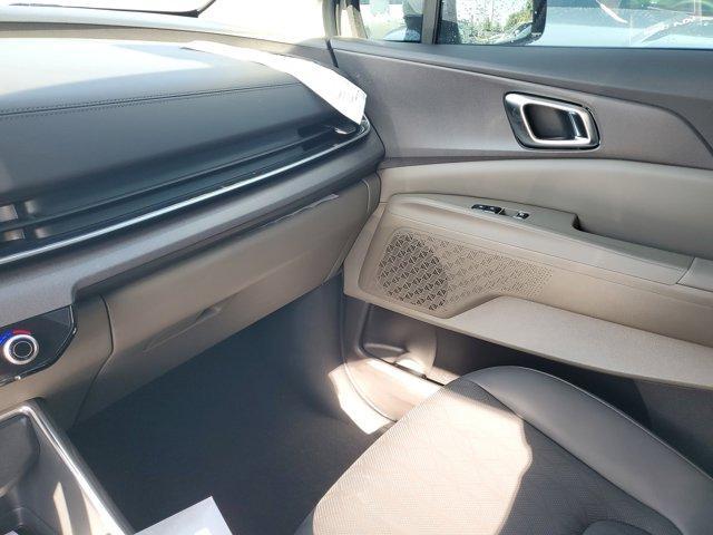 Photo of 2025 Ivory Silver Kia Carnival