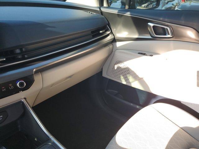 Photo of 2025 Ivory Silver Kia Carnival Hybrid