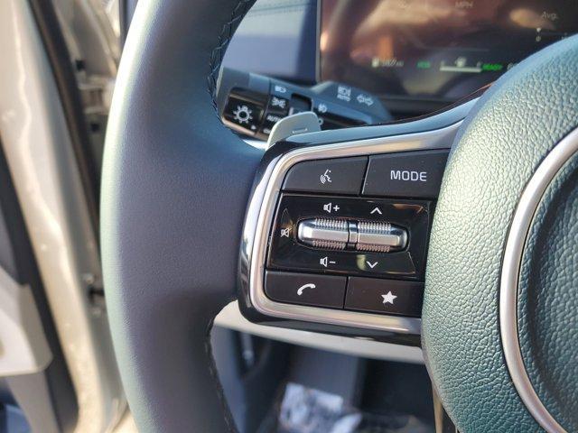 Photo of 2025 Ivory Silver Kia Carnival Hybrid