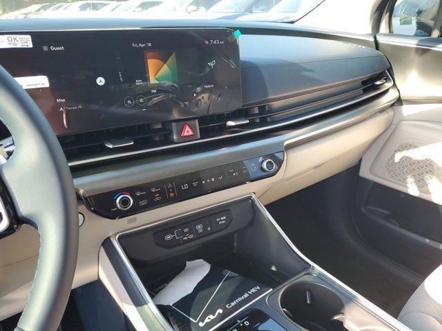 Photo of 2025 Ivory Silver Kia Carnival Hybrid