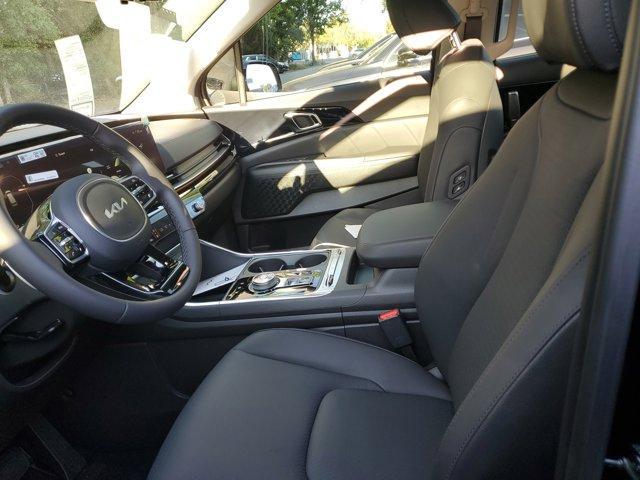 Photo of 2025 Aurora Black Pearl Kia Carnival Hybrid