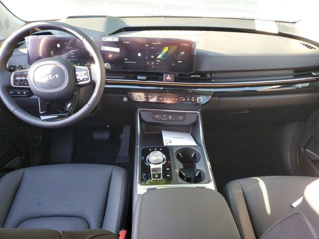 Photo of 2025 Aurora Black Pearl Kia Carnival Hybrid