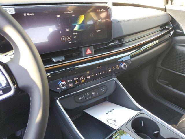 Photo of 2025 Aurora Black Pearl Kia Carnival Hybrid