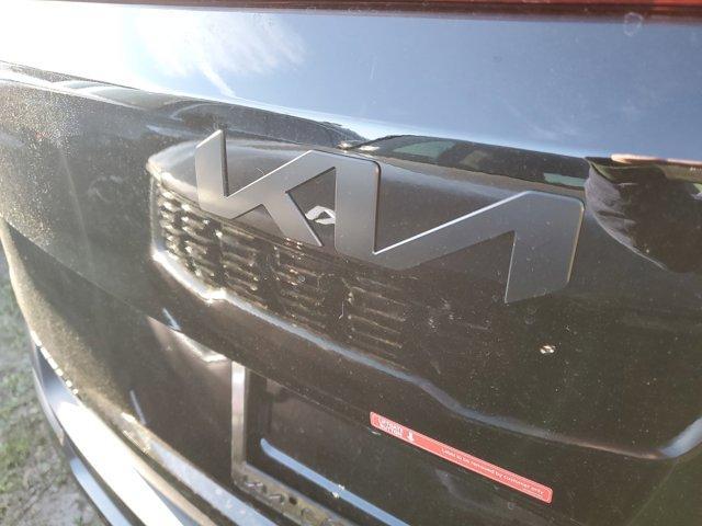 Photo of 2025 Aurora Black Pearl Kia Carnival Hybrid