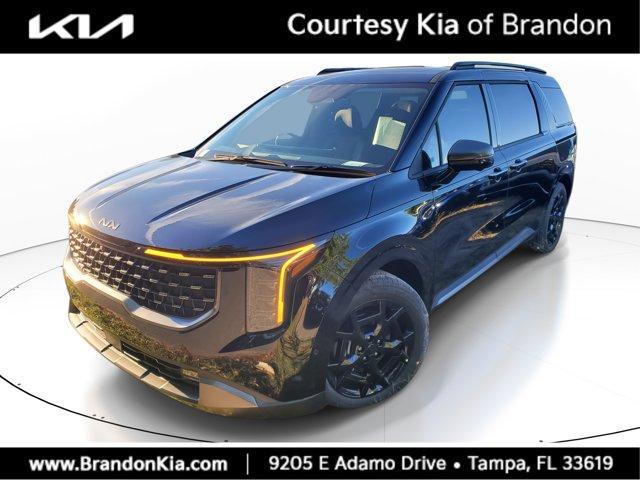 Photo of 2025 Aurora Black Pearl Kia Carnival Hybrid