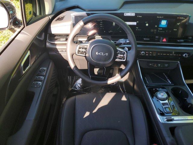 Photo of 2025 Ivory Silver Kia Carnival Hybrid