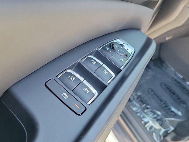 Photo of 2025 Ivory Silver Kia Carnival Hybrid