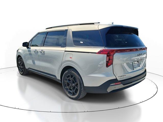 Photo of 2025 Ivory Silver Kia Carnival Hybrid