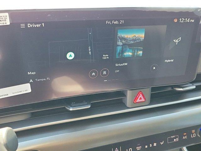 Photo of 2025 Ivory Silver Kia Carnival Hybrid