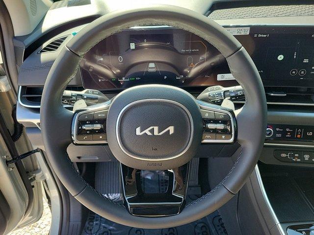 Photo of 2025 Ivory Silver Kia Carnival Hybrid