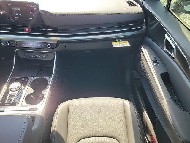 Photo of 2025 Ivory Silver Kia Carnival Hybrid
