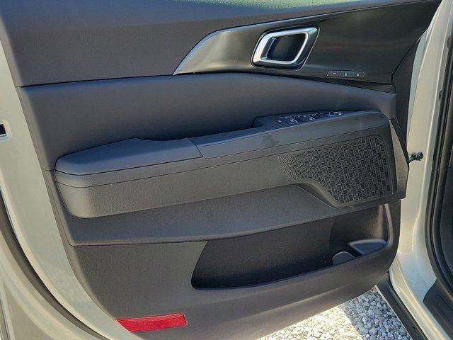 Photo of 2025 Ivory Silver Kia Carnival Hybrid