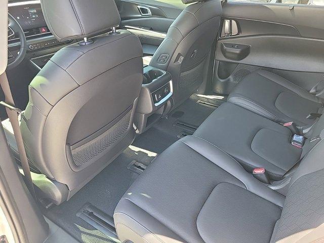 Photo of 2025 Ivory Silver Kia Carnival Hybrid