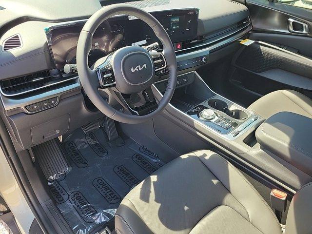 Photo of 2025 Ivory Silver Kia Carnival Hybrid