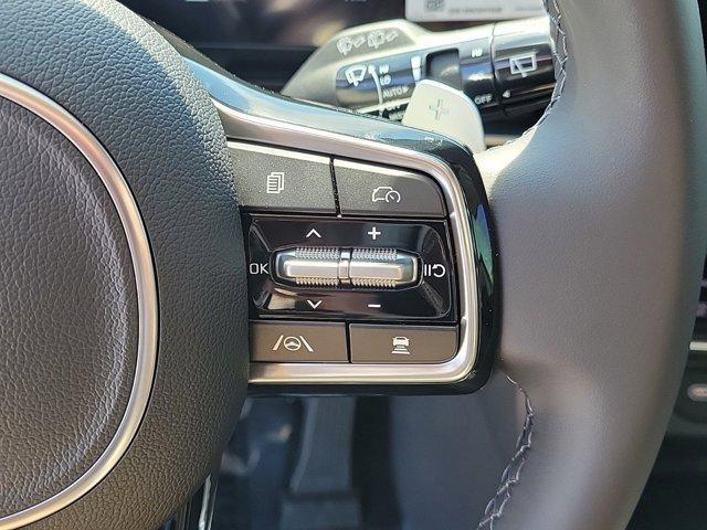 Photo of 2025 Ivory Silver Kia Carnival Hybrid