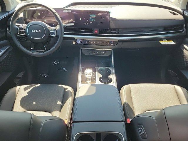 Photo of 2025 Ivory Silver Kia Carnival Hybrid