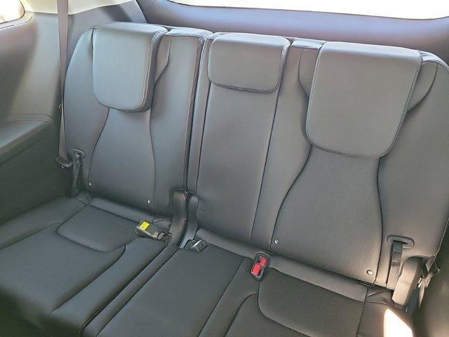 Photo of 2025 Ivory Silver Kia Carnival Hybrid