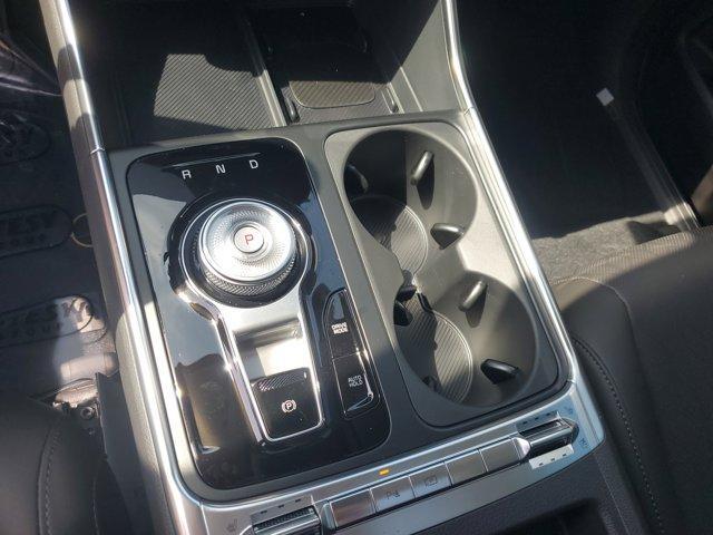 Photo of 2025 Ivory Silver Kia Carnival Hybrid