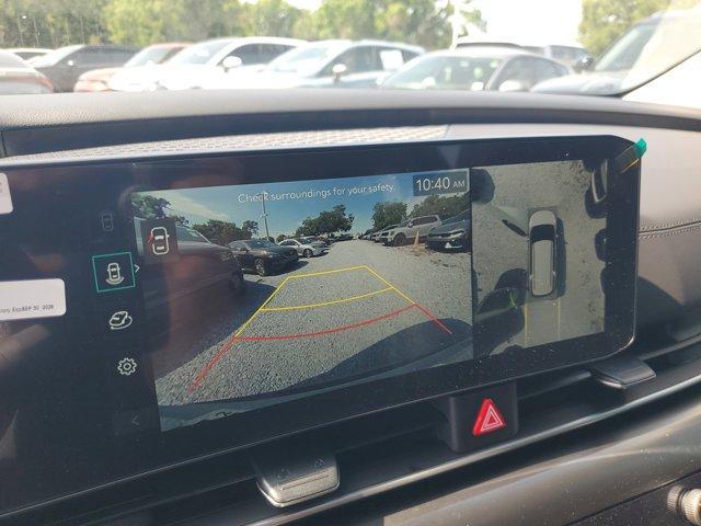 Photo of 2025 Ivory Silver Kia Carnival Hybrid