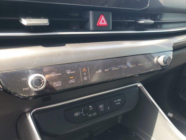 Photo of 2025 Ivory Silver Kia Carnival Hybrid