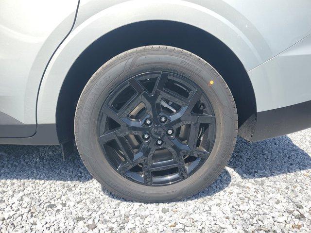 Photo of 2025 Ivory Silver Kia Carnival Hybrid