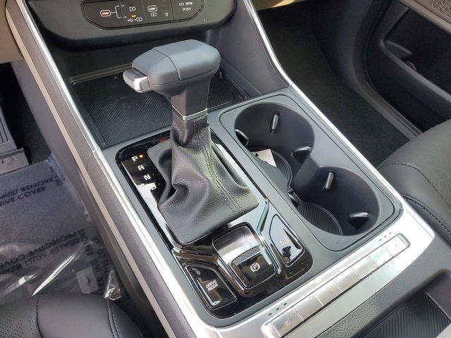 Photo of 2025 Ivory Silver Kia Carnival