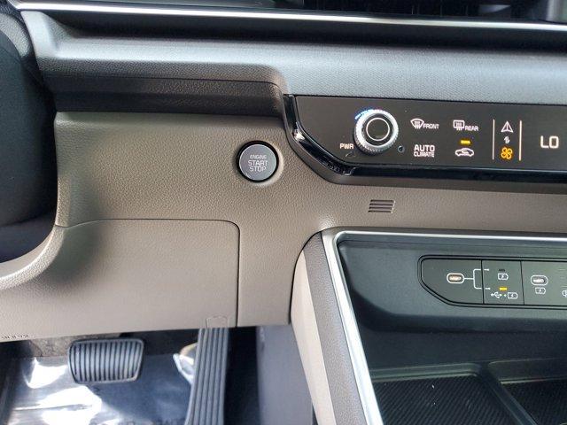 Photo of 2025 Ivory Silver Kia Carnival