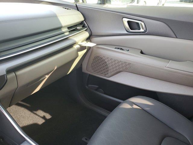 Photo of 2025 Ivory Silver Kia Carnival
