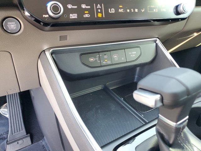 Photo of 2025 Ivory Silver Kia Carnival
