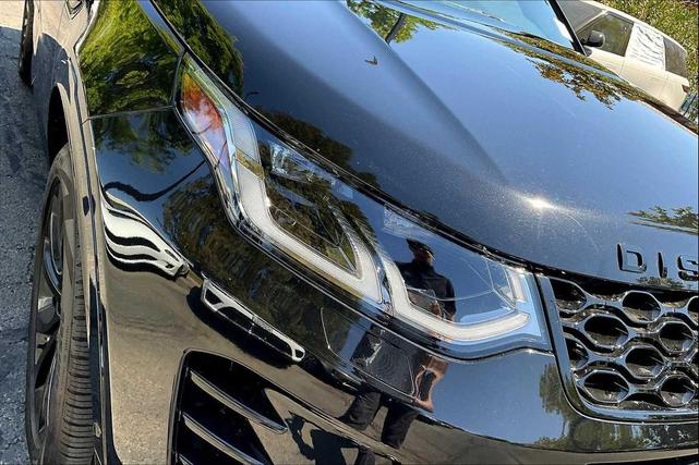 Photo of 2024 Santorini Black Metallic Land Rover Discovery Sport