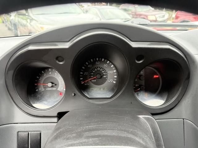 Photo of 2002 Red Nissan Frontier