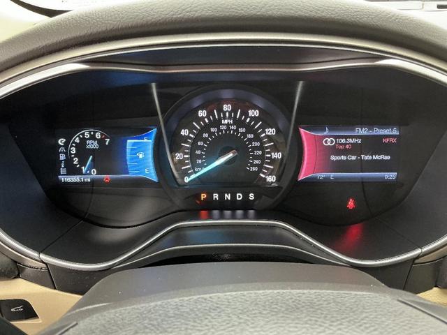 Photo of 2014 Orange Ford Fusion