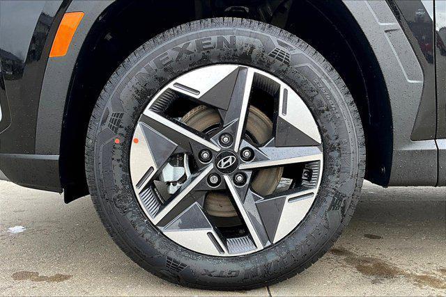 Photo of 2025 Black Hyundai TUCSON Hybrid